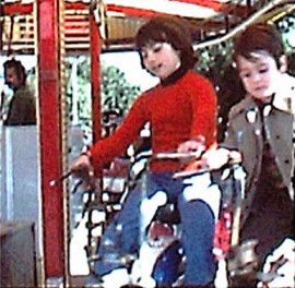 Riding Mini Marcelino on a Merry-Go-Round